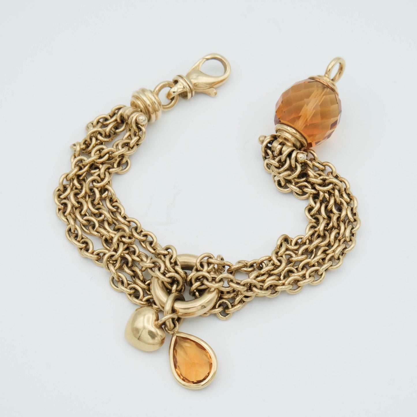 Bracciale 4 fili, catena oro giallo 18 kt e topazio sfaccettato 24 gr