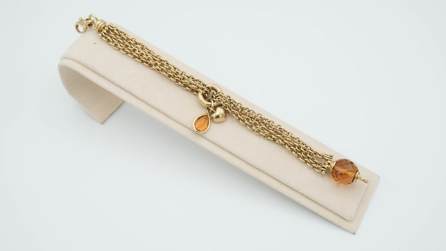 Bracciale 4 fili, catena oro giallo 18 kt e topazio sfaccettato 24 gr