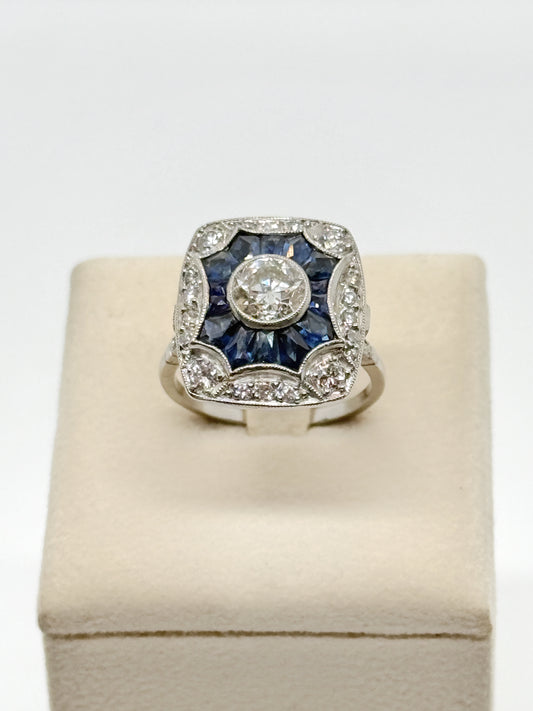 Anello Art decó in platino, brillante centrale 1 ct e zaffiri e 0,30 ct brillanti a giro