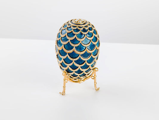 Uovo Fabergé in argento e smalto blu